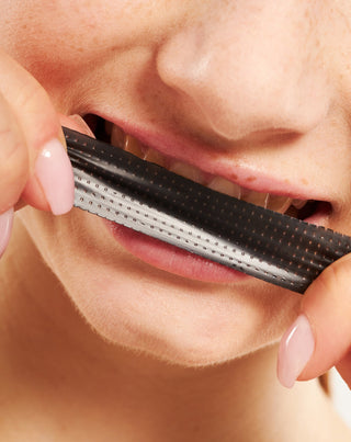 O conjunto de 28 tiras de branqueamento dentário White(ning) Stripes Smilebite. - 2